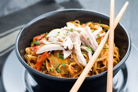 Delicious red curry with bamboo shoots, zucchini, carrots, broccoli, green beans, cabbage, mushrooms and basil leaves. Thai Curry Noodles with Chicken - Comfort food in a bowl!