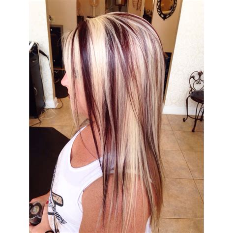 highlights with red violet lowlights by brittany at stouts salon in knoxville tennessee blonde