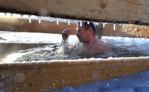 Russia An Icy Plunge For Orthodox Christians Pictures Cbs News