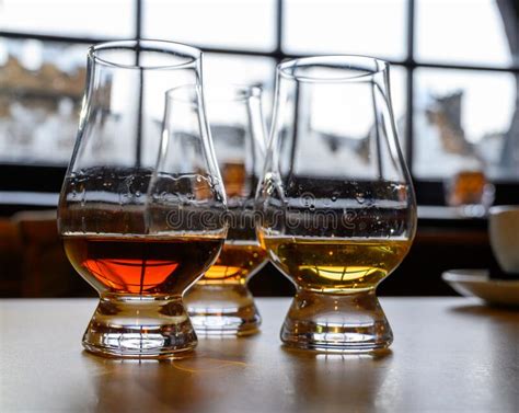 Flight Of Scottish Whisky Tasting Glasses With Variety Of Single Malts Or Blended Whiskey