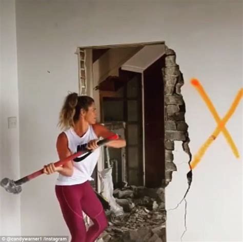Candice Warner Demolishes A Wall With A Sledgehammer Daily Mail Online