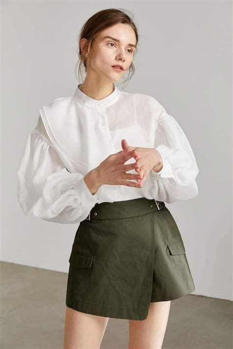 Womens Sheer White Button Up Blouse With An Asymmetrical Ruffle Front