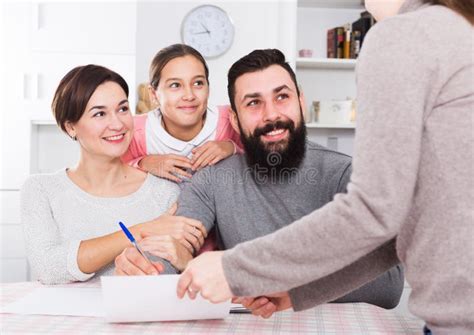 Parents Signing Property Papers Stock Photo Image Of Agreement Girl