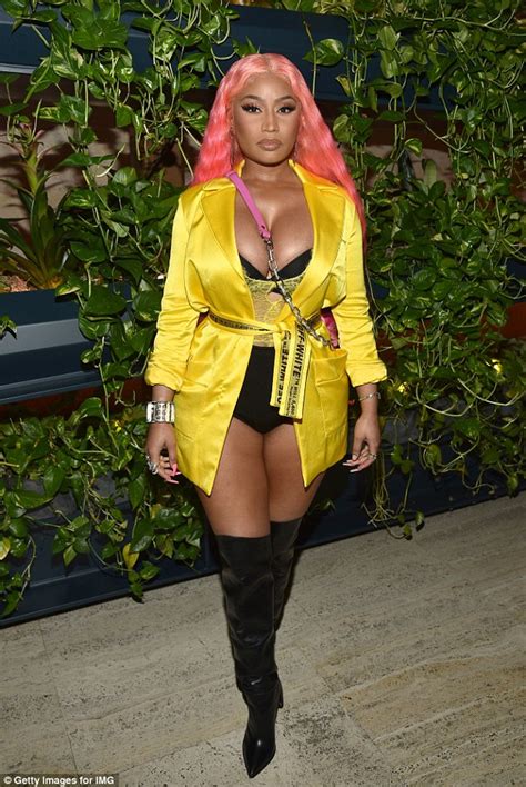 Nicki Minaj Brings The Va Va Voom In Black Lingerie And Coat Combo At New York Fashion Week Bash