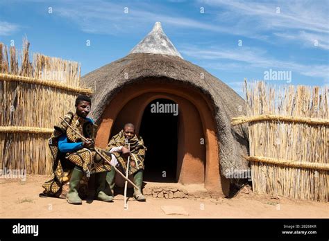 Basotho Men In Front Of Traditional Hut Thaba Bosiu Cultural Village Lesotho Stock Photo Alamy