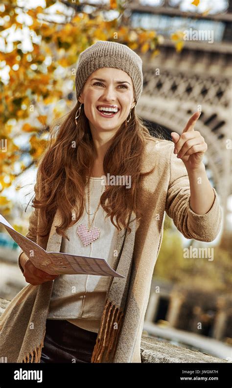 Autumn Getaways In Paris Smiling Young Tourist Woman On Embankment