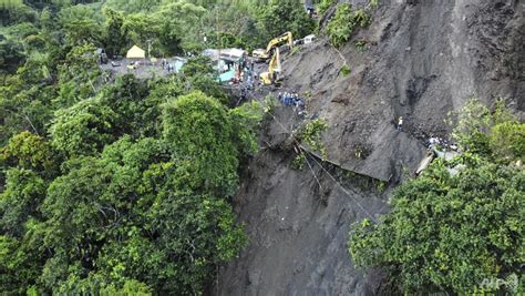 landslide buries bus in colombia killing at least 34 cna