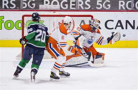 Edmonton oilers' kailer yamamoto (56) is stopped by vancouver canucks goalie braden holtby (49) during first period nhl action in edmonton on wednesday, january 13, 2021. Vancouver Canucks vs Edmonton Oilers NHL Picks, Odds ...