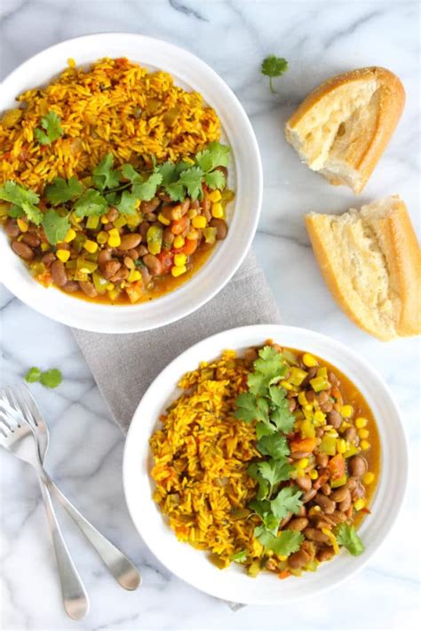 Cook for 25 minutes until there is just a thin layer of bubbling water over. Puerto Rican Rice and Beans - #foodbyjonister