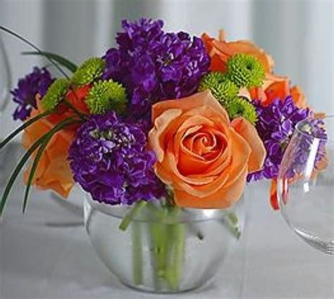 Purple green and white centerpiece. Triadic- orange, purple, green | Orange centerpieces ...