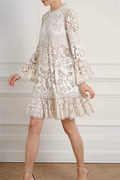 The smaller inner petals have green markings. CR20 New Season Snowdrop Mini Dress in Pearl Rose/Chalk ...