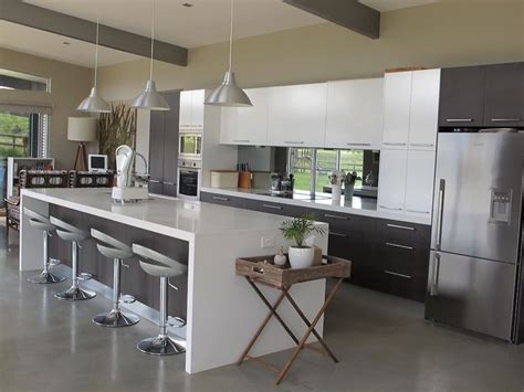 Streamline your kitchen with a modern dining set. nice colours | Contemporary kitchen island, Kitchen design ...
