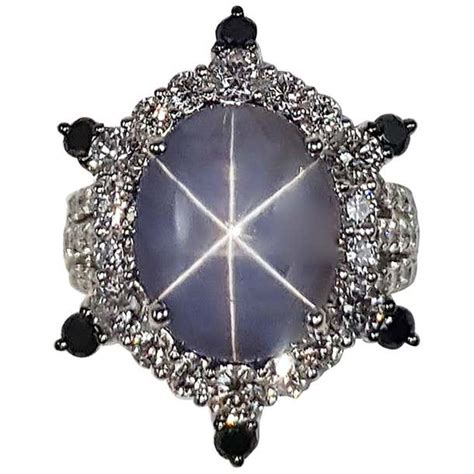 Blue Star Sapphire With Diamond And Black Diamond Ring In 18 Karat
