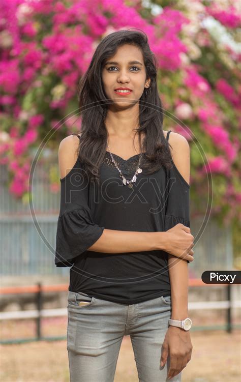 Image Of Young Indian Girl Posing Outdoor With Nature Background