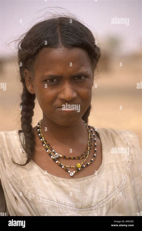 Portrait Of Fulani Girl From Burkina Faso In Traditional Dress And