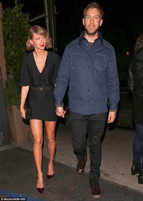 taylor swift shows some skin in black dress as she holds hands with calvin harris daily mail
