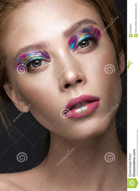 Beautiful Girl With Creative Colorful Makeup Beauty Face Stock Image