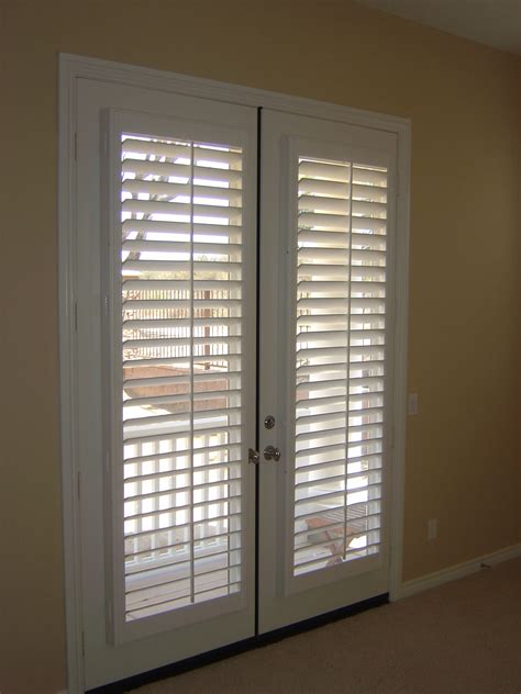Despite already looking beautiful on their own, an appropriate window treatment can add some much needed color, exaggerate the size of the doors, block out the light during the sunniest. French doors interior blinds | Hawk Haven