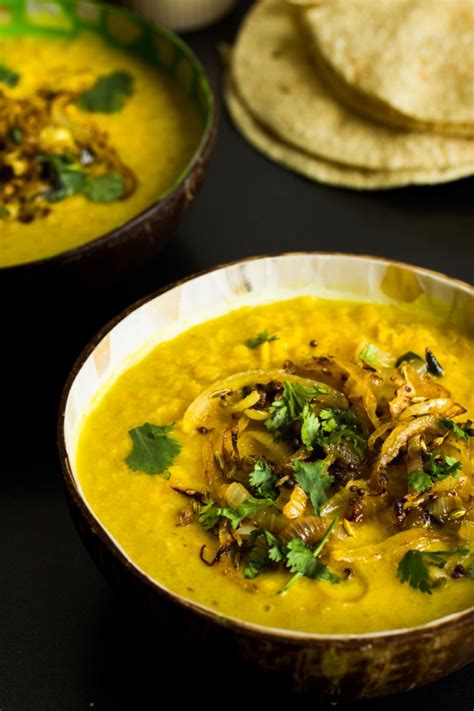 Simple, flavorful curried yellow lentils seasoned with fresh spices, garlic, ginger, and swimming in a curried coconut sauce. Sri Lankan Coconut Lentil Curry Recipe | The Bellephant