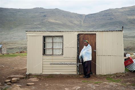 Photos And Pictures Of Sotho Woman At Her Shack On The Top Of Sani