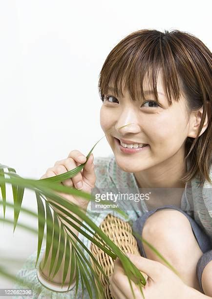 Woman Pinching Face Photos And Premium High Res Pictures Getty Images