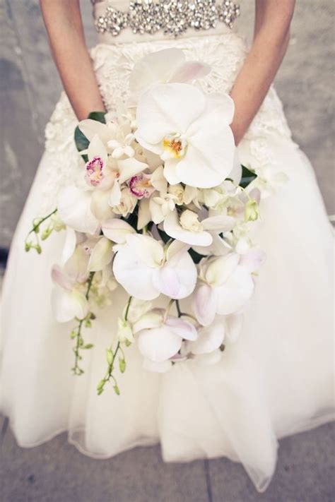Orchid wedding party bouquets will add training and beauty to any specific bride's corsage. orchid bouquets | wedding bouquet featuring cymbidium ...