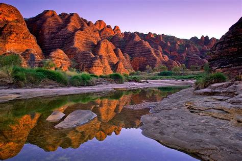 The Striped Beehive Shaped Towers Of The Bungle Bungles Reflected In