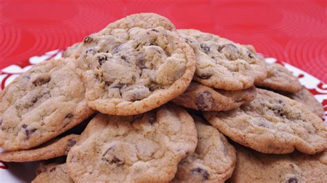 Using an ice cream scoop, scoop 6 balls of dough onto a baking tray lined with parchment paper. Chocolate Chip Cookies Recipe | Dishin' With Di - Cooking ...