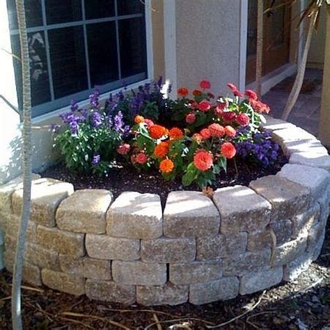 The Stone Paver Retaining Wall I Built Makes A Perfect Raised Flower