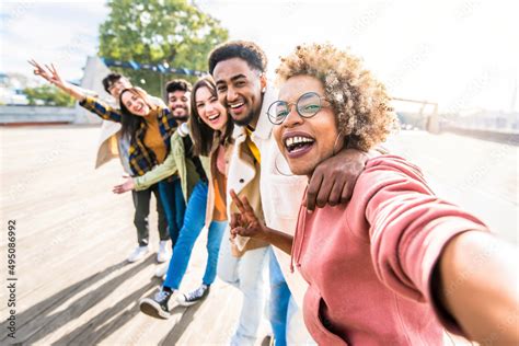 Multiracial Friends Group Taking Selfie Pic With Smartphone Outside