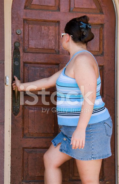 Women Opening Door Stock Photo Royalty Free Freeimages