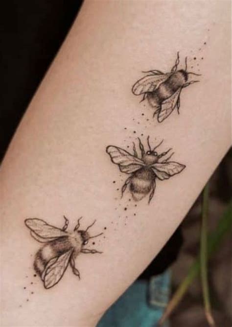 Three Bees Tattoo On The Arm
