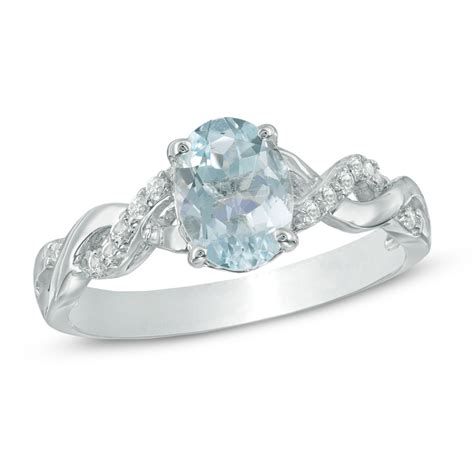 Oval Aquamarine And Lab Created White Sapphire Twist Ring In Sterling