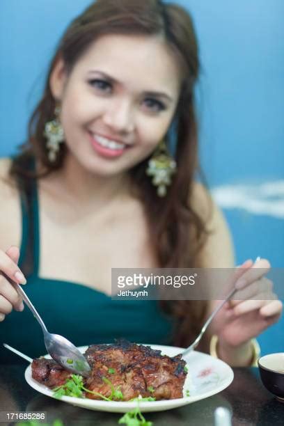 Asian Girl Eat Pork Photos And Premium High Res Pictures Getty Images