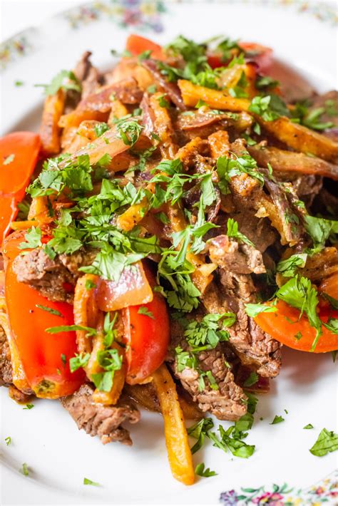 Season the sliced meat with salt and pepper to taste. Lomo Saltado (Peruvian Beef Stir Fry) - Cooking Therapy ...