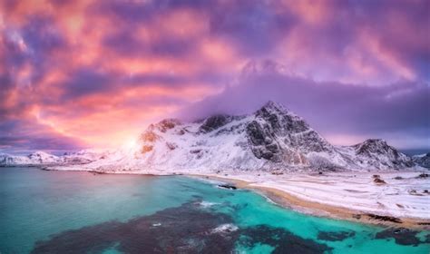 Premium Photo Nordic Sandy Beach With Blue Sea In Winter At Sunset In