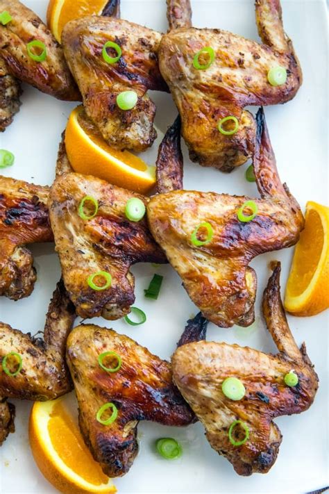 Chinese orange chicken made with crispy fried chicken covered in an authentic orange sauce. Easy Oven Orange Jerk Chicken Wings - Must Love Home