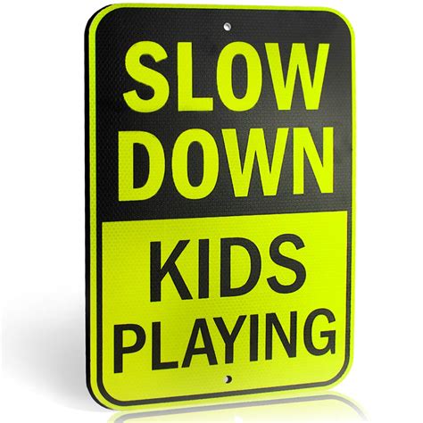 Slow Down Kids Playing Sign For Street Children At Play Yard Sign