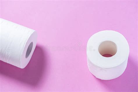 Eco Friendly White Toilet Paper On A Pink Background Close Up Stock
