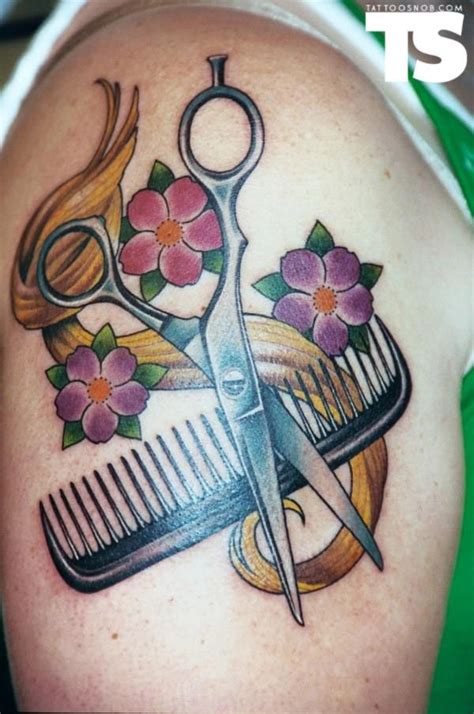 Comb And Scissor In Mirror Tattoo On Shoulder