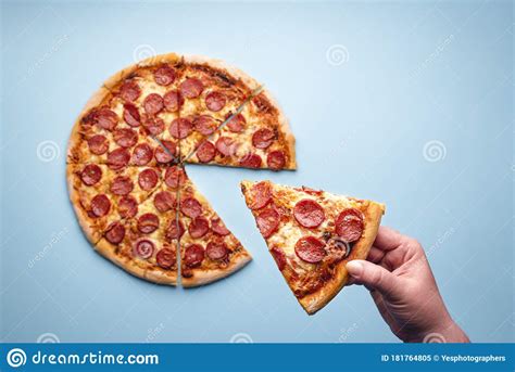 Taking A Slice Of Pepperoni Pizza Top View Stock Image Image Of Food