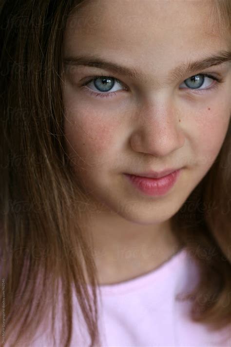 Portrait Of Beautiful Blue Eyed Girl Wearing Pink Del Colaborador De