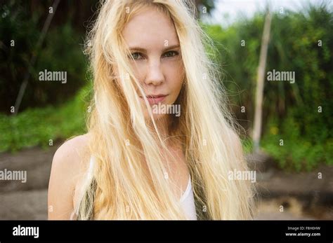 Serious Caucasian Woman Standing On Beach Stock Photo Alamy