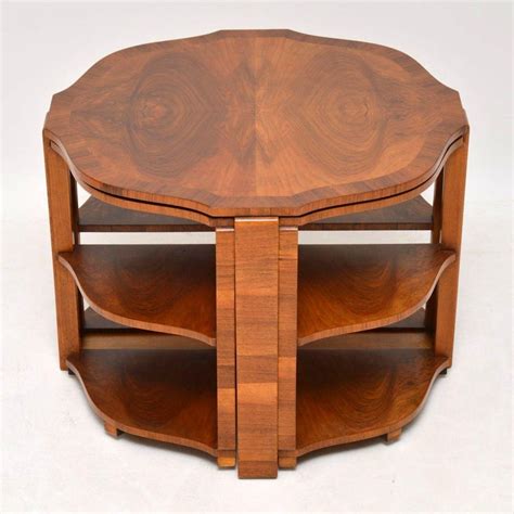 $5.00 coupon applied at checkout. 1920s Art Deco Walnut Nesting Coffee Table For Sale at 1stdibs