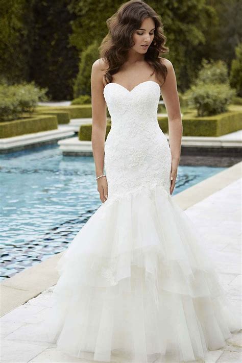 Weddings on the beach or beach themed weddings are different. Beach Wedding Dresses: 14 Beautiful Designs - hitched.co.uk