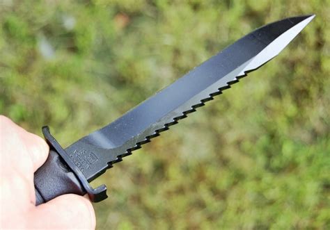 Glock Field Knife 81 Black Fixed Blade Sawback With Polymer Sheath Made