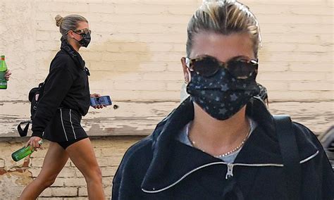 Sofia Richie Showcases Her Toned Legs In Black Tennis Skirt While Out