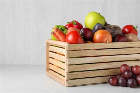 Wooden Crate Full Of Different Vegetables And Fruits Harvesting Time