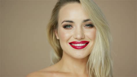 Headshot Of Beautiful Young Female Model With Blonde Hair And Red Lips