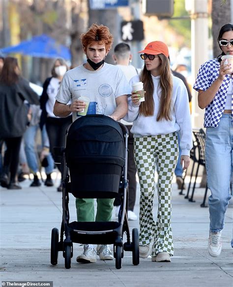 Kj Apa Embraces Girlfriend Clara Berry During Stroll With Their Baby